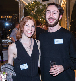 A woman and man at the New York City holiday party